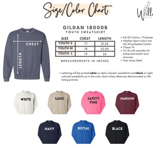 a long sleeved shirt with the name of the product on it