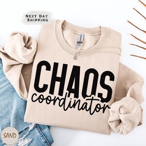 a t - shirt that says chaos contort on it