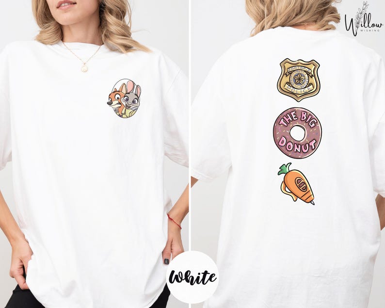 A woman wearing a white t-shirt with a cartoon character and a police badge on the back.