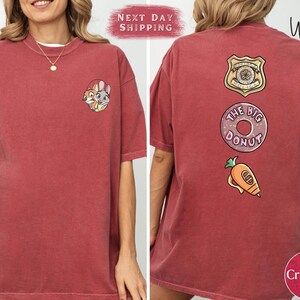 The image is a collage of two photos of a person wearing a red t-shirt with various cartoon-style designs and text on the back.