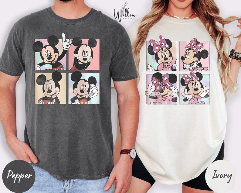 A man wearing a gray t-shirt with a graphic of Mickey Mouse and a woman wearing a white t-shirt with a graphic of Minnie Mouse.