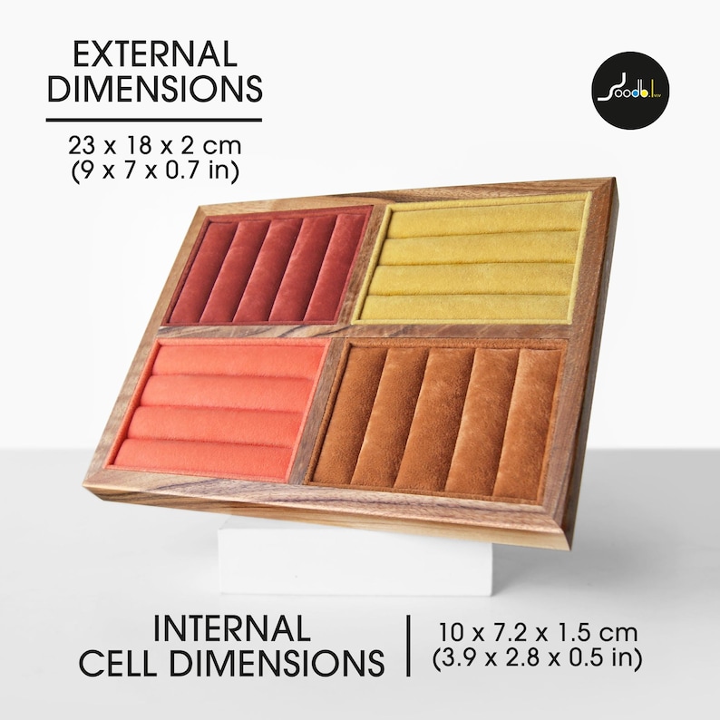 May include: A rectangular wooden jewelry display tray featuring four distinct velvet-lined sections in red, yellow, orange, and brown. The external dimensions are 9 x 7 x 0.7 inches, and the internal cell dimensions are 3.9 x 2.8 x 0.5 inches.