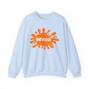90's Kid Nostalgia Sweatshirt with Retro Nickelodeon Inspired Artwork - Must-Have for the Ultimate 90's Kid