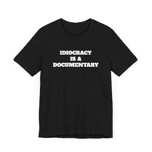 Idiocracy is a Documentary Short Sleeve Tee