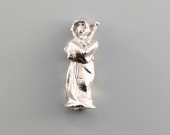 La Faucheuse, figurine de la mort coulée en argent massif