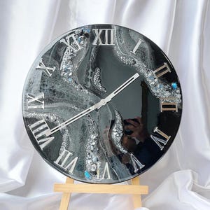 Geode style epoxy resin clock close-up with natural stones