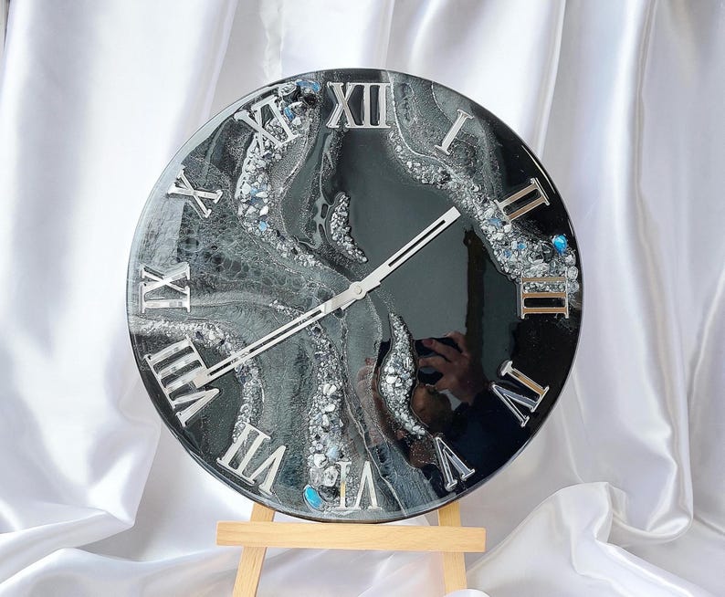 Geode style epoxy resin clock close-up with natural stones