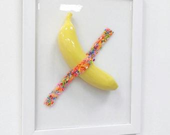 Framed Boujee Banana is a 3d Printed Banana Taped Inside a