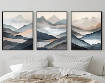 Puede incluir: Tres impresiones abstractas de paisajes enmarcadas en estilo acuarela. Las impresiones representan una cordillera con un lago en primer plano. Los colores son azul, gris y marrón.