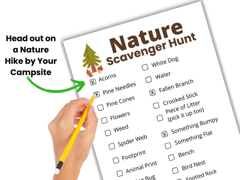 A Nature Scavenger Hunt with a hand holding a pencil and checking off items on the scavenger hunt checklist for hiking.
