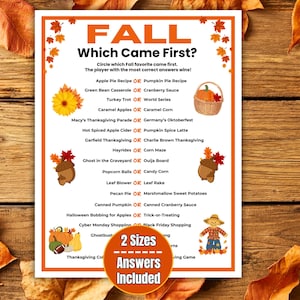 May include: A white paper game sheet titled FALL Which Came First? featuring a list of seasonal trivia questions with orange text accents, autumn-themed illustrations of pumpkins, acorns, and a scarecrow, and a circular orange badge stating 2 Sizes Answers Included.