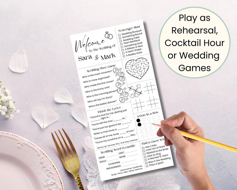 May include: A white wedding game sheet with the text "Welcome To The Wedding Of Sara & Mark". The sheet includes a scavenger hunt, a wedding shoe game, and other games. The text "Play as Rehearsal, Cocktail Hour or Wedding Games" is also present.