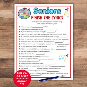 May include: A white paper game sheet titled "Seniors Finish the Lyrics" with fill-in-the-blank song lyrics. The sheet includes a red circle with the words "Answer Key" and "Size US, A4 & 5x7". A blue pen rests on the bottom right.