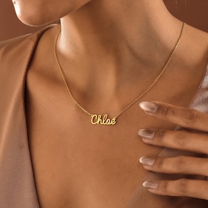 Celebrate loved ones with a 14K Gold Name Necklace. A one-of-a-kind gift for her, for mom, or anyone close to your heart. Perfect for birthdays, holidays, or simply because.