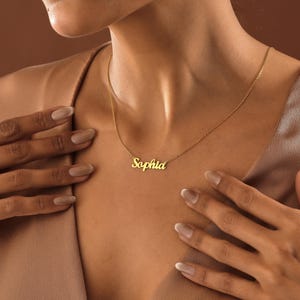 Personalized and timeless, this 14K Gold Name Necklace honors memories. Give a gift that captures connection—for her, mom, or anyone you cherish, from birthdays to everyday elegance.