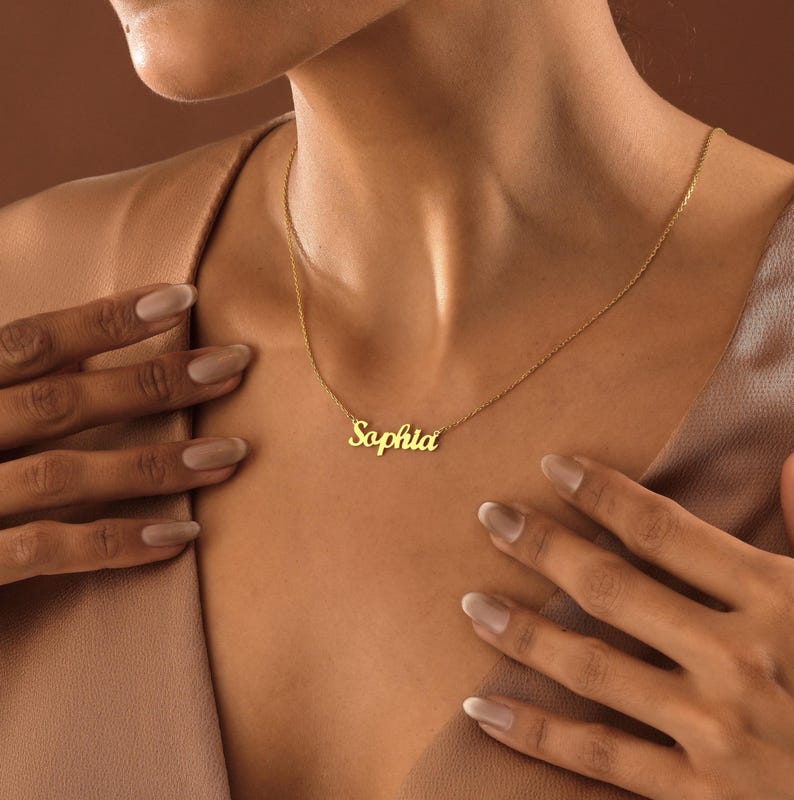 Personalized and timeless, this 14K Gold Name Necklace honors memories. Give a gift that captures connection—for her, mom, or anyone you cherish, from birthdays to everyday elegance.