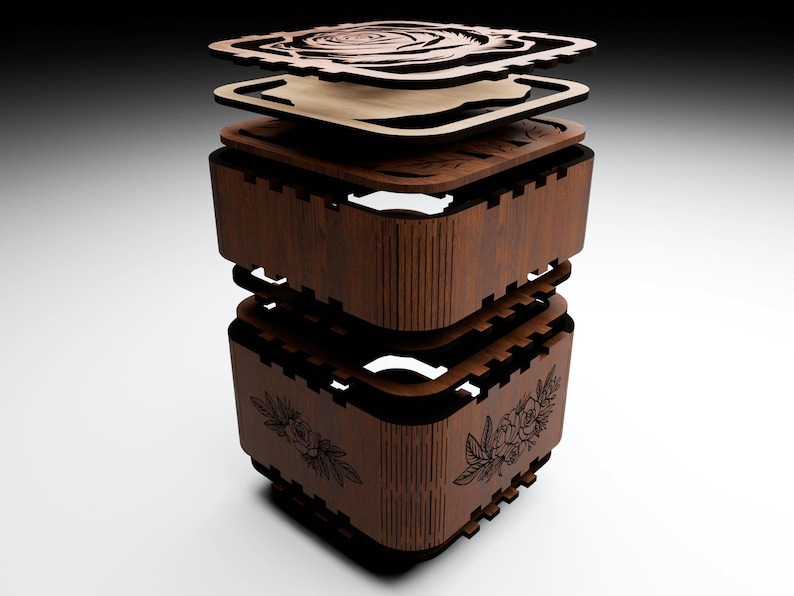 May include: A wooden box with a rose design on the top and a floral design on the side. The box is made of multiple layers of wood and is assembled in a way that allows it to be opened and closed.