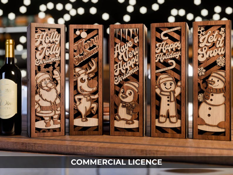 May include: Wooden Christmas-themed wine bottle boxes with laser-cut designs. Each box features a different holiday character and message: Santa, reindeer, penguin, snowman, and gingerbread man. The boxes are brown with black and white striped backgrounds.