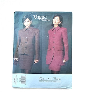May include: Vogue Patterns sewing pattern featuring a suit designed by Oscar de la Renta. The pattern includes a jacket and skirt. The cover shows two women wearing the suit in different colors. The pattern size is 8-10-12.