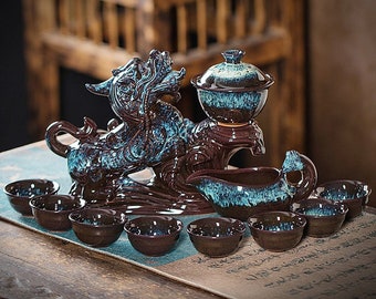 Horno automático personalizado para hacer té convertido en juego de té de cerámica retro/juego de té giratorio creativo Pixiu/juego de té Kung Fu