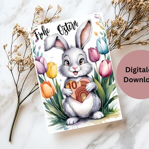 Carte de Pâques lapin avec coeur cadeau d'argent, exauce les vœux de Pâques, emballer joliment l'argent, offrir de l'argent comme cadeau de dernière minute, carte à imprimer