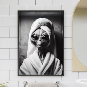 May include: A black and white illustration of an alien wearing a white bathrobe and a towel on its head. The alien has large, black eyes and a gray face.