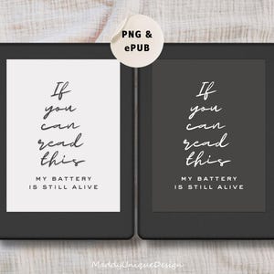 May include: Two digital reader screens with black frames. The screens display the text "If you can read this, my battery is still alive." in white text on a white background and a black background.