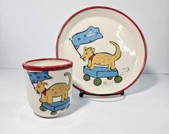 Vintage Child's Cup and Plate Set - Dog on Skateboard w/ Flag Art Pottery Signed