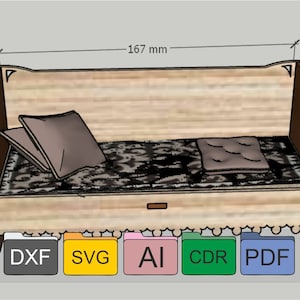May include: A wooden daybed with a black and white patterned mattress and two brown pillows. The daybed is 167 mm long. The image includes file format icons for DXF, SVG, AI, CDR, and PDF.