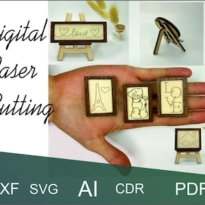 Könnte beinhalten: Digitale Laser-Schneidedateien zum Erstellen von Holzschildern. Die Designs beinhalten "Love", "Home", "Paris", einen Teddybär und das Wort "Love".
