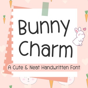 May include: A pink background with a white note pad with the text "Bunny Charm" in black handwritten font. The text "A Cute & Neat Handwritten Font" is below the title. The background is decorated with white bunnies, carrots, and hearts.