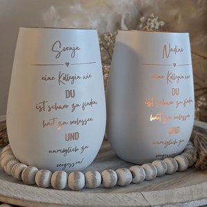 May include: Two white ceramic candle holders with a rose gold metallic finish. The candle holders have a quote about a colleague on each side. The quote on the left says "Svenja, a colleague like you is hard to find, hard to leave and impossible to forget." The quote on the right says "Nadine, a colleague like you is hard to find, hard to leave and impossible to forget."