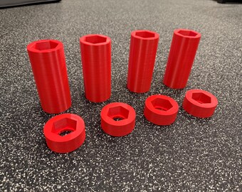 Almacenamiento en rack con puerto hexagonal rojo para accesorios de aisladores antibalas (pernos y tuercas M24)