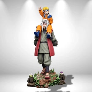 May include: A detailed anime character figurine featuring a tall man with long white hair wearing a red and grey robe, carrying a young boy with spiky blonde hair in an orange outfit on his shoulders, standing on a rocky base with two small creatures.
