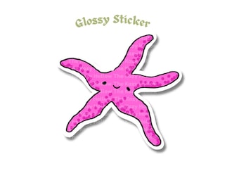 Puede incluir: Una pegatina de estrella de mar rosa con una cara sonriente. La pegatina tiene un acabado brillante.
