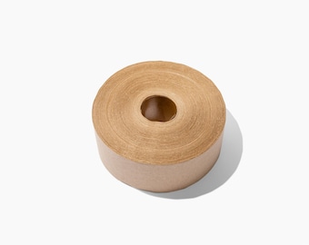 May include: A roll of brown packing tape, a common item used for sealing boxes and packages.