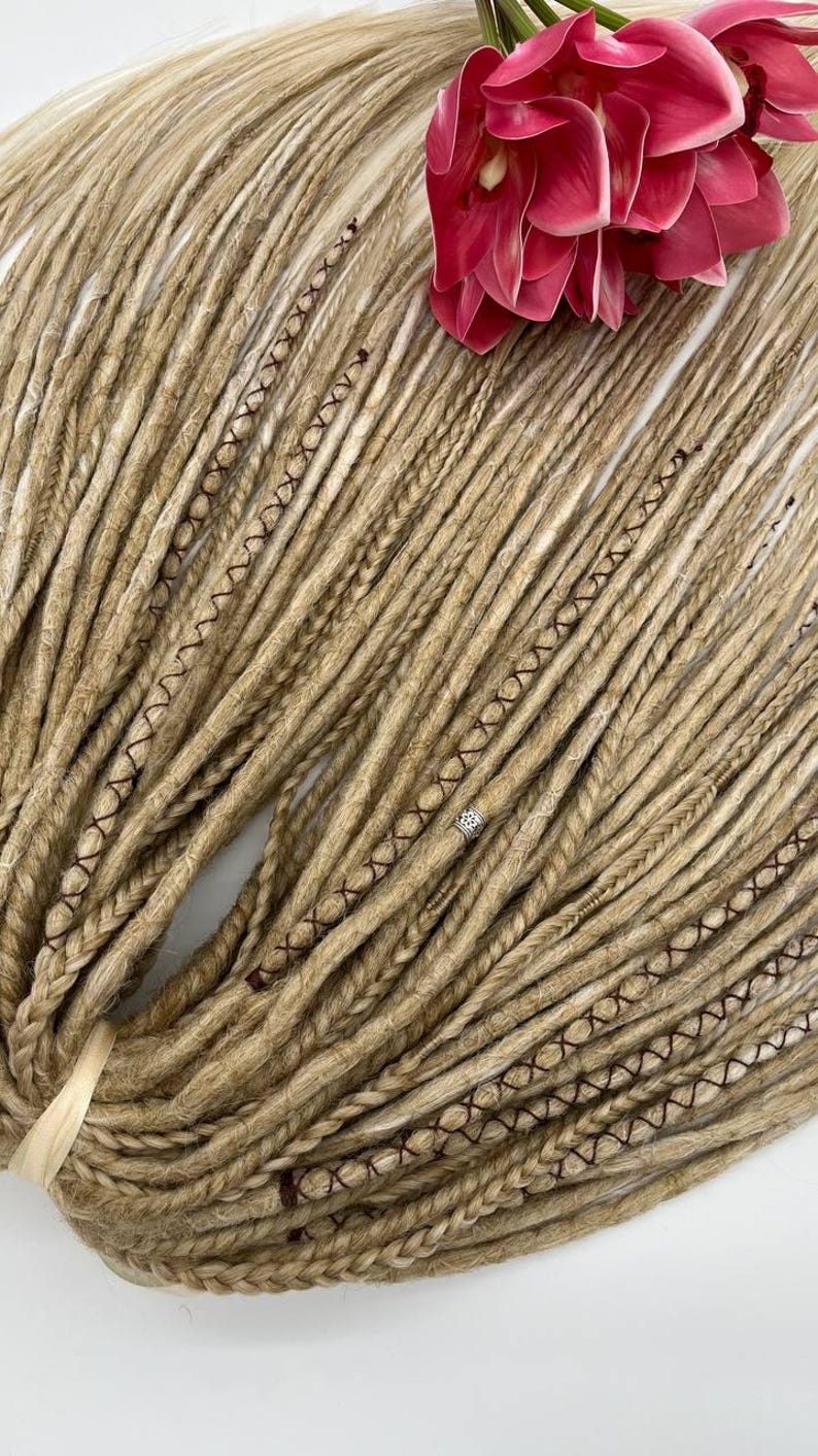 These are synthetic blonde dreads and braids. This set can be in two versions: double ended and single ended dreadlocks, or as they are called for short - DE and SE. This handmade set is made of absolutely safe synthetic material - Kanekalon.