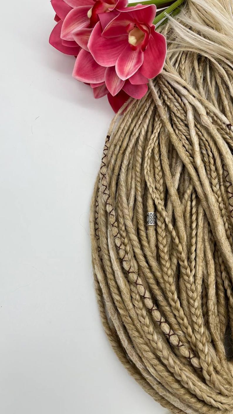These are synthetic blonde dreads and braids. This set can be in two versions: double ended and single ended dreadlocks, or as they are called for short - DE and SE. This handmade set is made of absolutely safe synthetic material - Kanekalon.