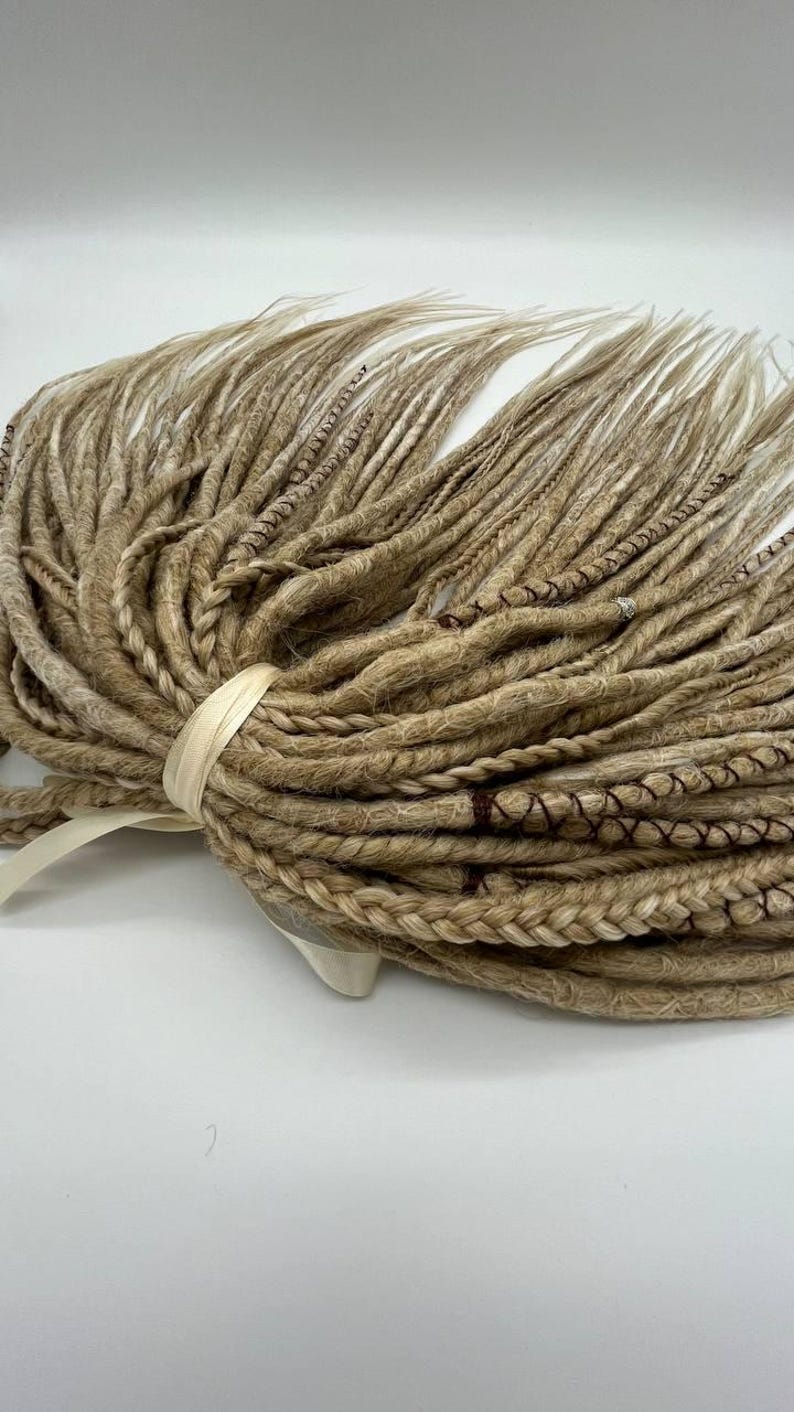 These are synthetic blonde dreads and braids. This set can be in two versions: double ended and single ended dreadlocks, or as they are called for short - DE and SE. This handmade set is made of absolutely safe synthetic material - Kanekalon.