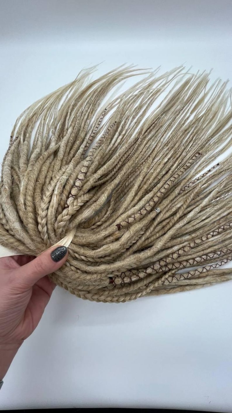 These are synthetic blonde dreads and braids. This set can be in two versions: double ended and single ended dreadlocks, or as they are called for short - DE and SE. This handmade set is made of absolutely safe synthetic material - Kanekalon.