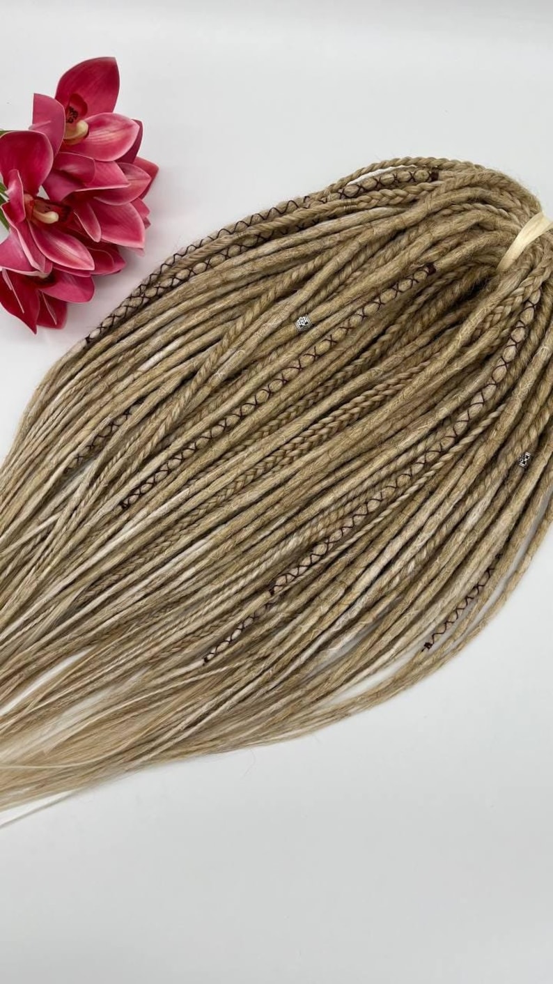 These are synthetic blonde dreads and braids. This set can be in two versions: double ended and single ended dreadlocks, or as they are called for short - DE and SE. This handmade set is made of absolutely safe synthetic material - Kanekalon.