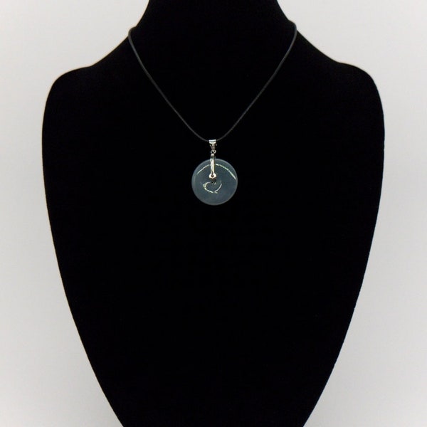Natural type A Jadeite Jade peanut pendant with a black necklace