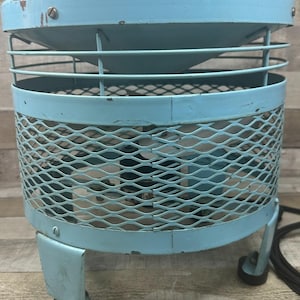 Taburete eléctrico vintage con ventilador de pie Emerson color turquesa, estilo art déco de los años 50, de metal. imagen 9