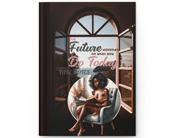 May include: A hardcover journal with a motivational quote, featuring an illustration of a woman reading by a window. The text reads "The Future depends on what you Do Today. Take Notes." The journal has a dark brown cover.
