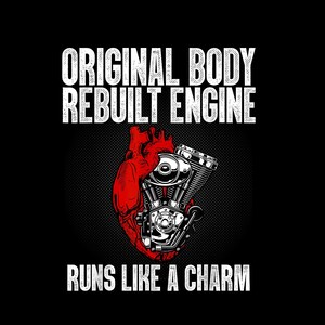 May include: A black graphic design featuring a red anatomical heart merged with a silver motorcycle engine. The text reads ORIGINAL BODY REBUILT ENGINE at the top and RUNS LIKE A CHARM at the bottom in a distressed white sans-serif font.