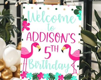 May include: Welcome to Addison's 5th Birthday sign featuring pink flamingos, tropical leaves, and gold glitter dots on a white background.