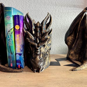 Fantasy Book Decor, Unique Bookend, Dragon Bookshelf Accent, Hand Painted Bookend, Magical Book Stand, Dragon Shelf Art, Decorative Bookend, Bookend Gift Idea, Dragon Bookend for Fantasy Lovers, Decorative Bookend for Collectors, Unique Dragon Decor for Bookshelves, Hand Painted Bookend with Antique Gold Finish, Fantasy Home Decor, Book Nook Accessories, Gifts for Bookworms, Medieval Room Decor, Reading Nook Ideas, Dragon Lover Gift, Bookshelf Statement Piece, Mythical Bookend, wings of fire