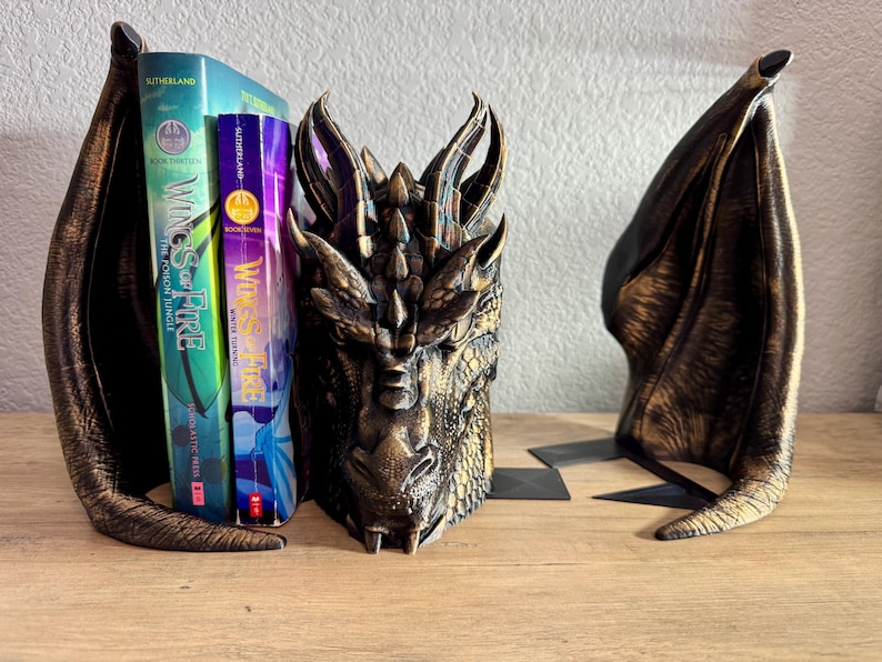 Fantasy Book Decor, Unique Bookend, Dragon Bookshelf Accent, Hand Painted Bookend, Magical Book Stand, Dragon Shelf Art, Decorative Bookend, Bookend Gift Idea, Dragon Bookend for Fantasy Lovers, Decorative Bookend for Collectors, Unique Dragon Decor for Bookshelves, Hand Painted Bookend with Antique Gold Finish, Fantasy Home Decor, Book Nook Accessories, Gifts for Bookworms, Medieval Room Decor, Reading Nook Ideas, Dragon Lover Gift, Bookshelf Statement Piece, Mythical Bookend, wings of fire