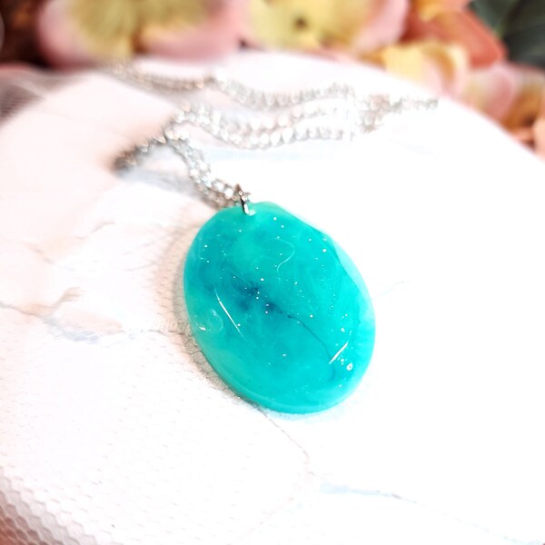 Chic Handmade Teal Teardrop Necklace: Glittery Teal Beauty, Epoxy Resin Craft. Elegant and Versatile Accessories.