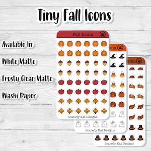 May include: Three sticker sheets with fall-themed icons, including pumpkins, acorns, apples, leaves, witch hats, candy corn, jack-o'-lanterns, ghosts, and pilgrim hats. The text "Tiny Fall Icons" is at the top. The stickers are available in white matte, frosty clear matte, and washi paper.